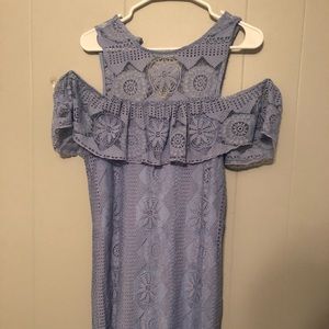 Blue floral shoulder-less dress.